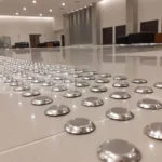 piso direcional em inox aplicado sobre porcelana instituto pele